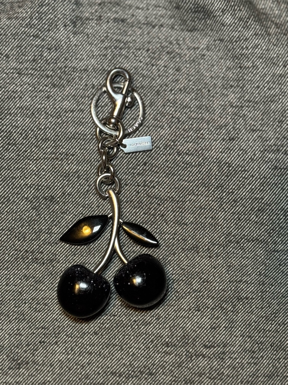 Coach cherry charm